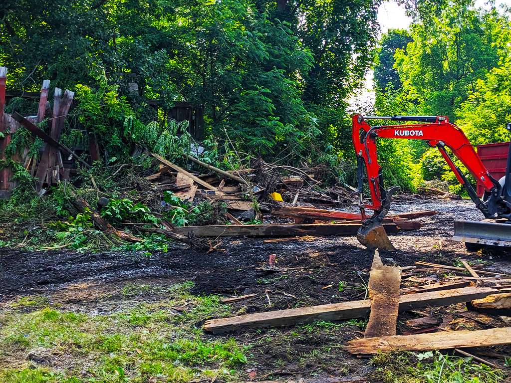 a jcb moving timber