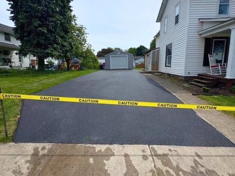 Asphalt Driveway and Gravel Pad Installation Project in Lyndonville, New York
