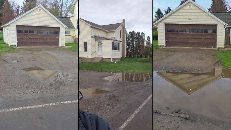 The potholes present in the driveway